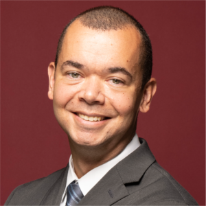 Headshot of Brett McNeal, JD